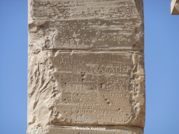 A pillar at Sounion, bearing engraved names of 19th-century visitors, among whom Lord Byron's (at the bottom, just above my own logo).